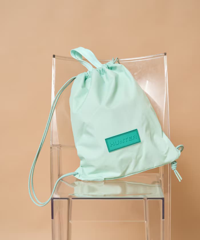 TRAVEL DRAWSTRING BACKPACK TOTE(耐水)【限定展開】